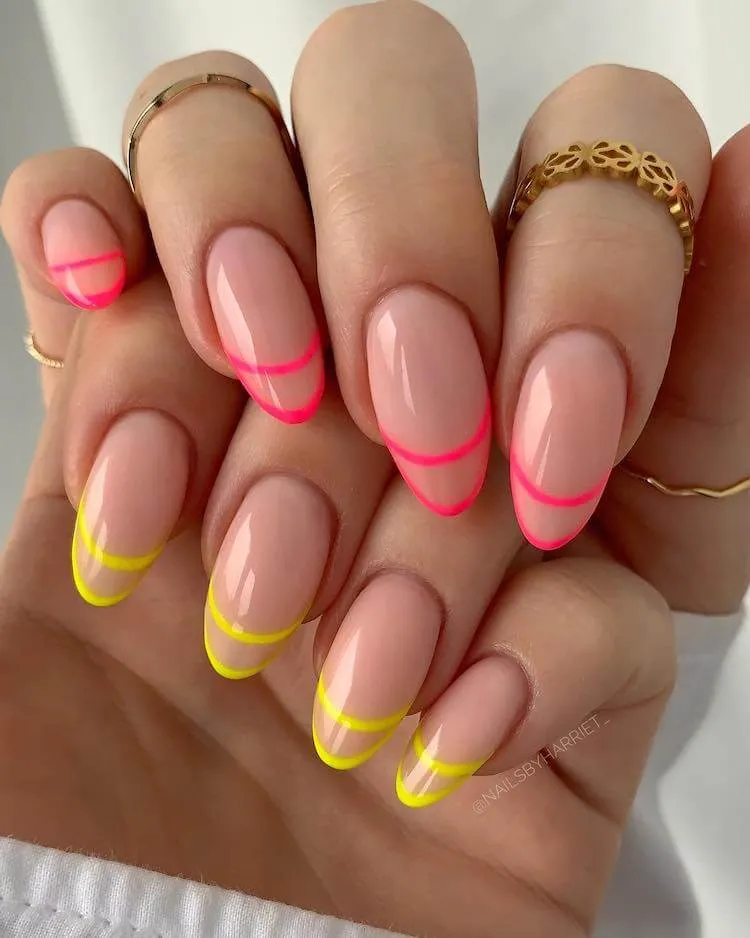 neonowe różowe i żółte paznokcie z podwójną linią