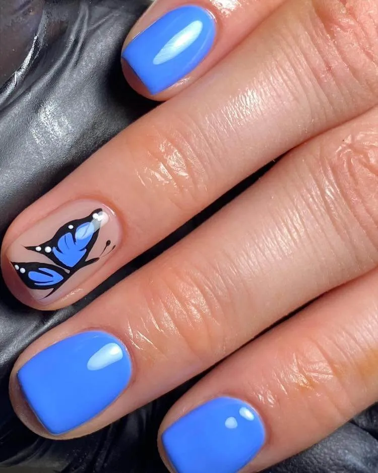 uñas azules mariposa