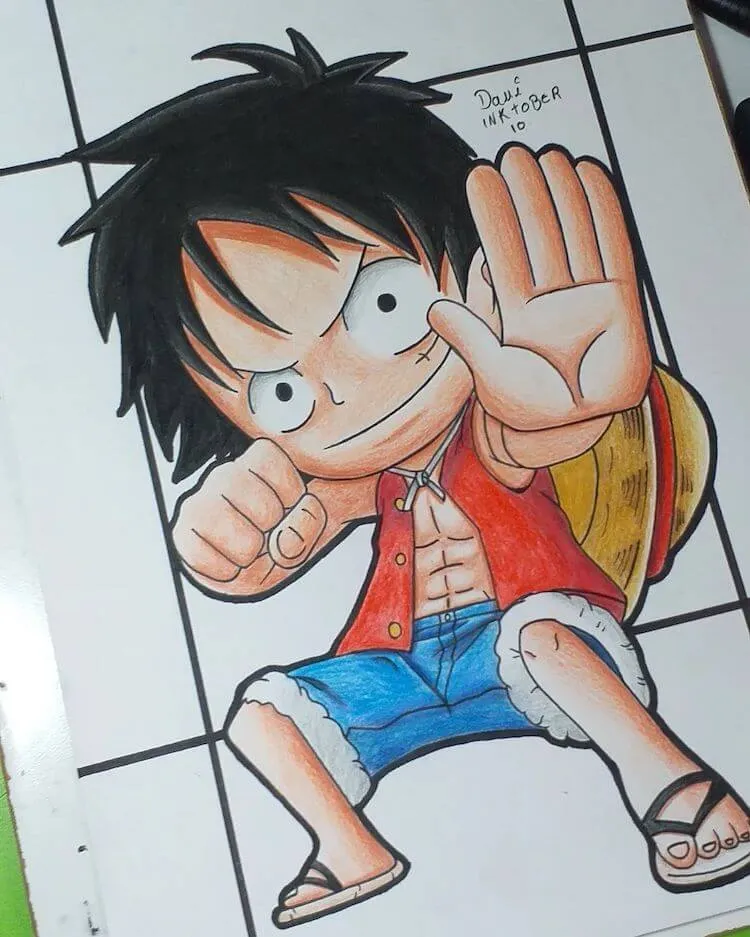 rysunek Luffy'ego trzymającego rękę