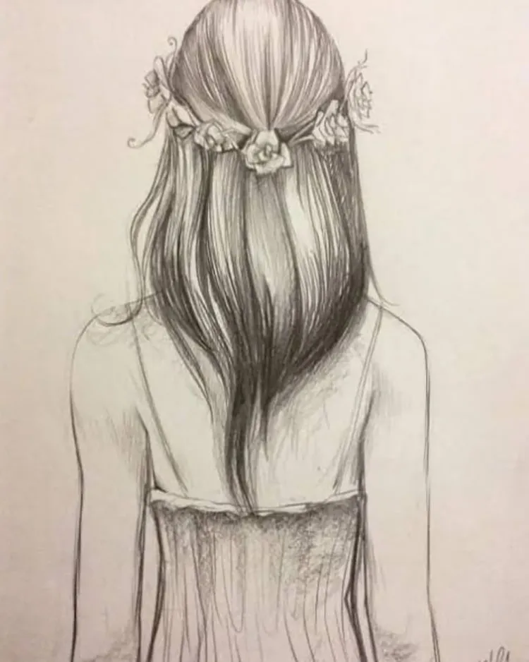 FILLE PORTANT UNE COURONNE DE FLEURS