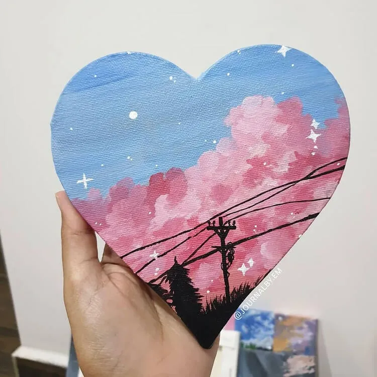 pintura sobre lienzo corazon con cielo nocturno