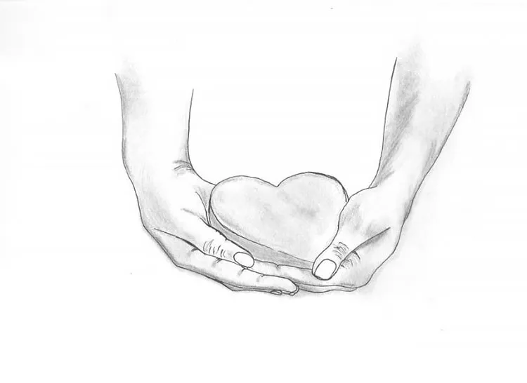 hånd som holder hjerte
